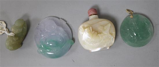 A Chinese jade figure, two jadeite plaques and a mother-of-pearl snuff bottle